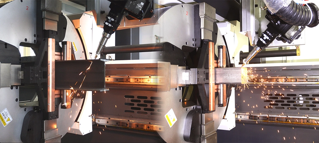 bir tüp lazer kesici ile metal bir tüp üzerinde hassas kesim.webp